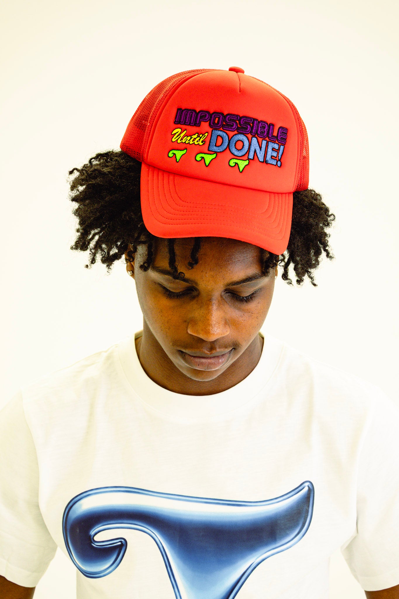 IMPOSSIBLE UNTIL DONE
Trucker Hats
